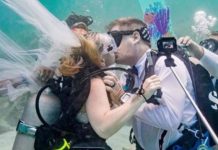 Couples wed 32ft down the sea to set a record (Photos)