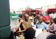 COVID-19: Black Stars head coach C.K Akonnor gives sanitizers to street hawkers