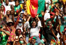Cameroon beat brave Comoros to clinch a quarter final place.
