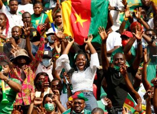 Cameroon beat brave Comoros to clinch a quarter final place.
